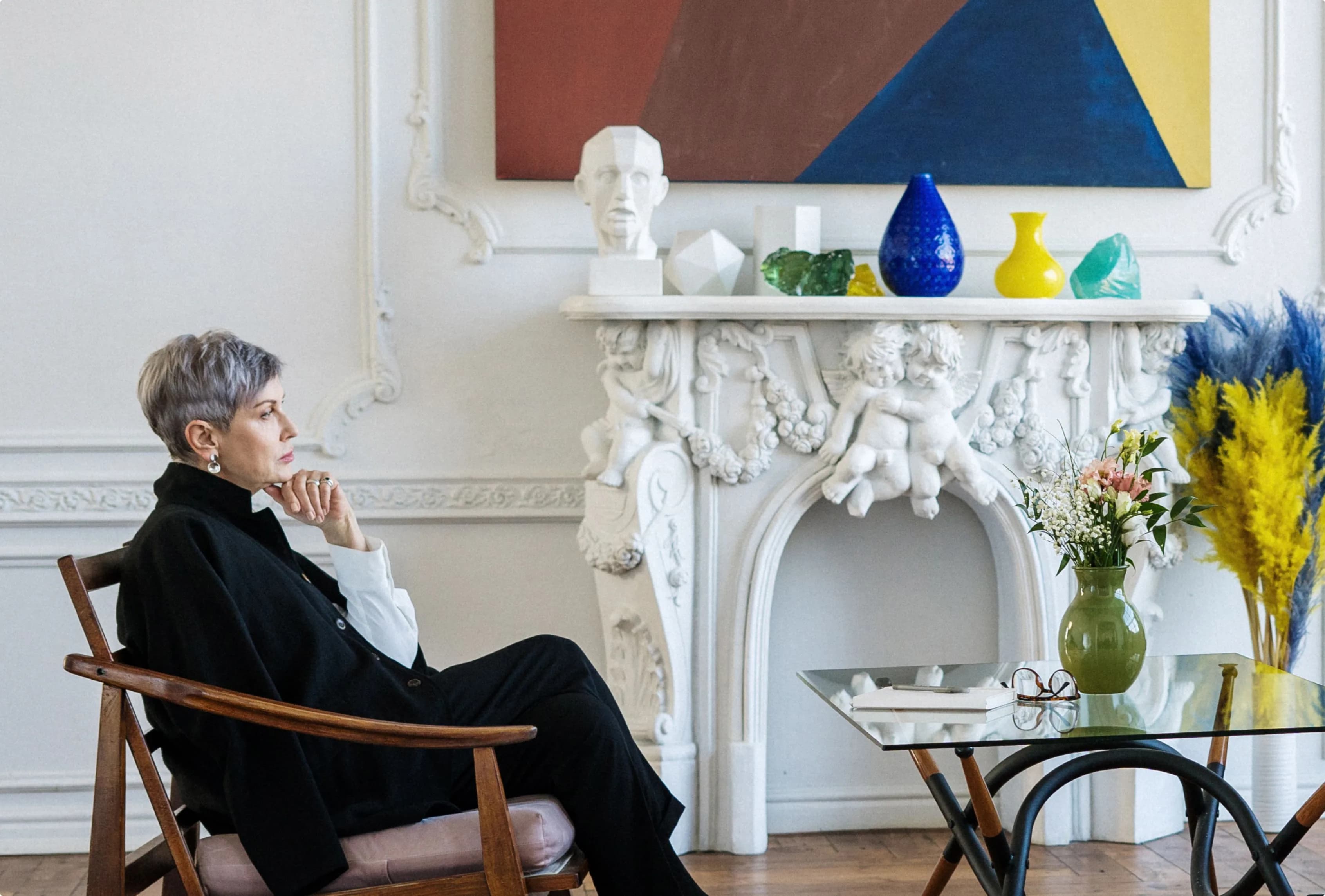 Gallery owner in a refined art space